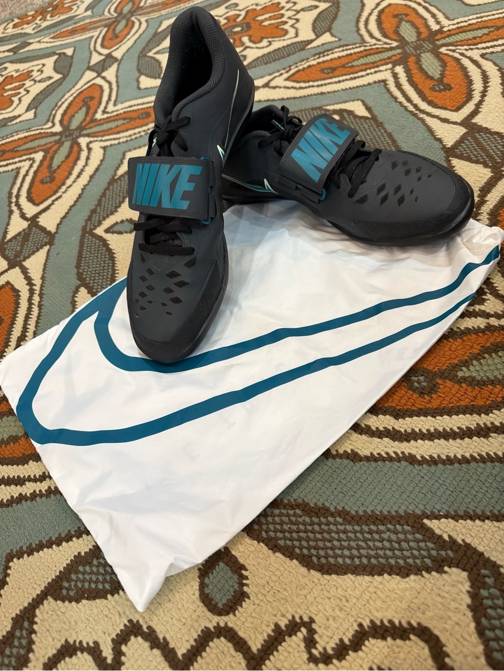 Nike Men’s Black Training Shoes with Blue Strap and Teal Swoosh